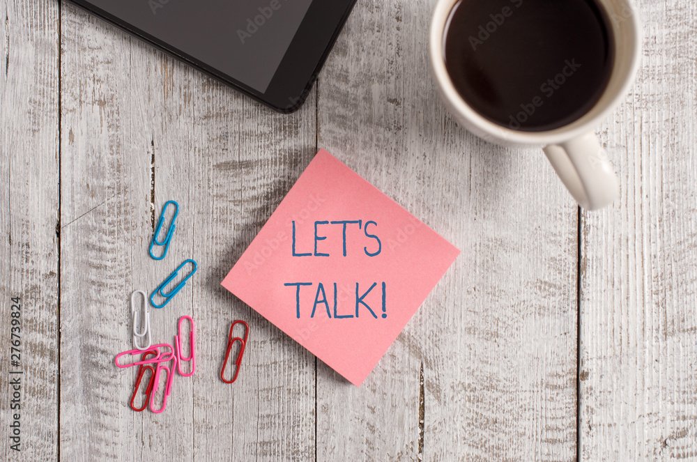 Handwriting text writing Let S Is Talk. Conceptual photo suggesting in the beginning of a conversation on the topic Stationary placed next to a cup of black coffee above the wooden table